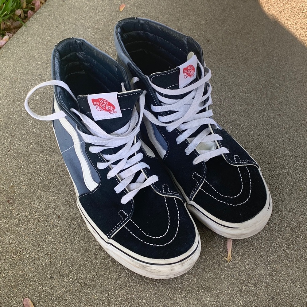 dark blue and light blue high top vans.